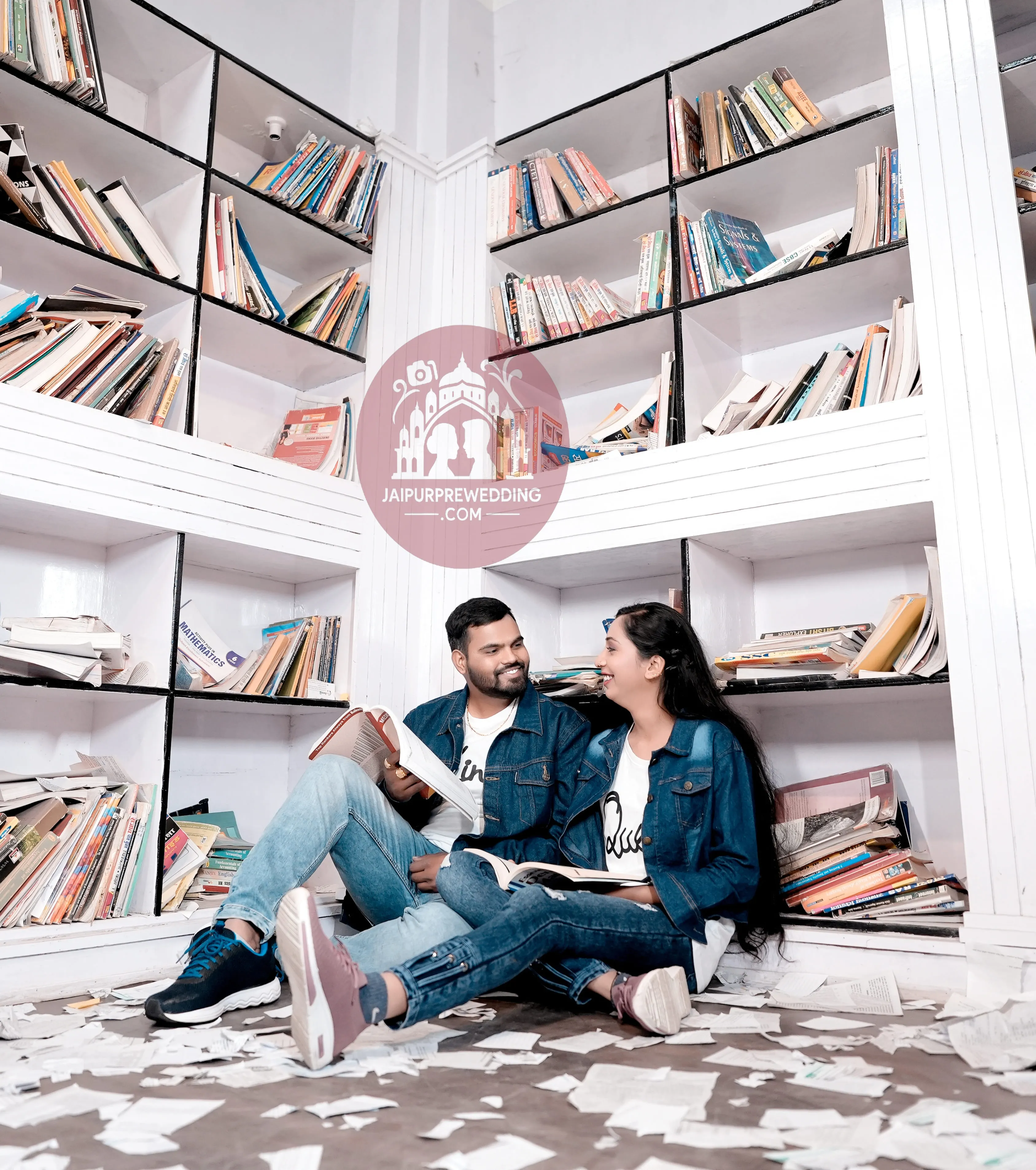 Couple library pre-wedding photoshoot Jaipur romantic reading scene