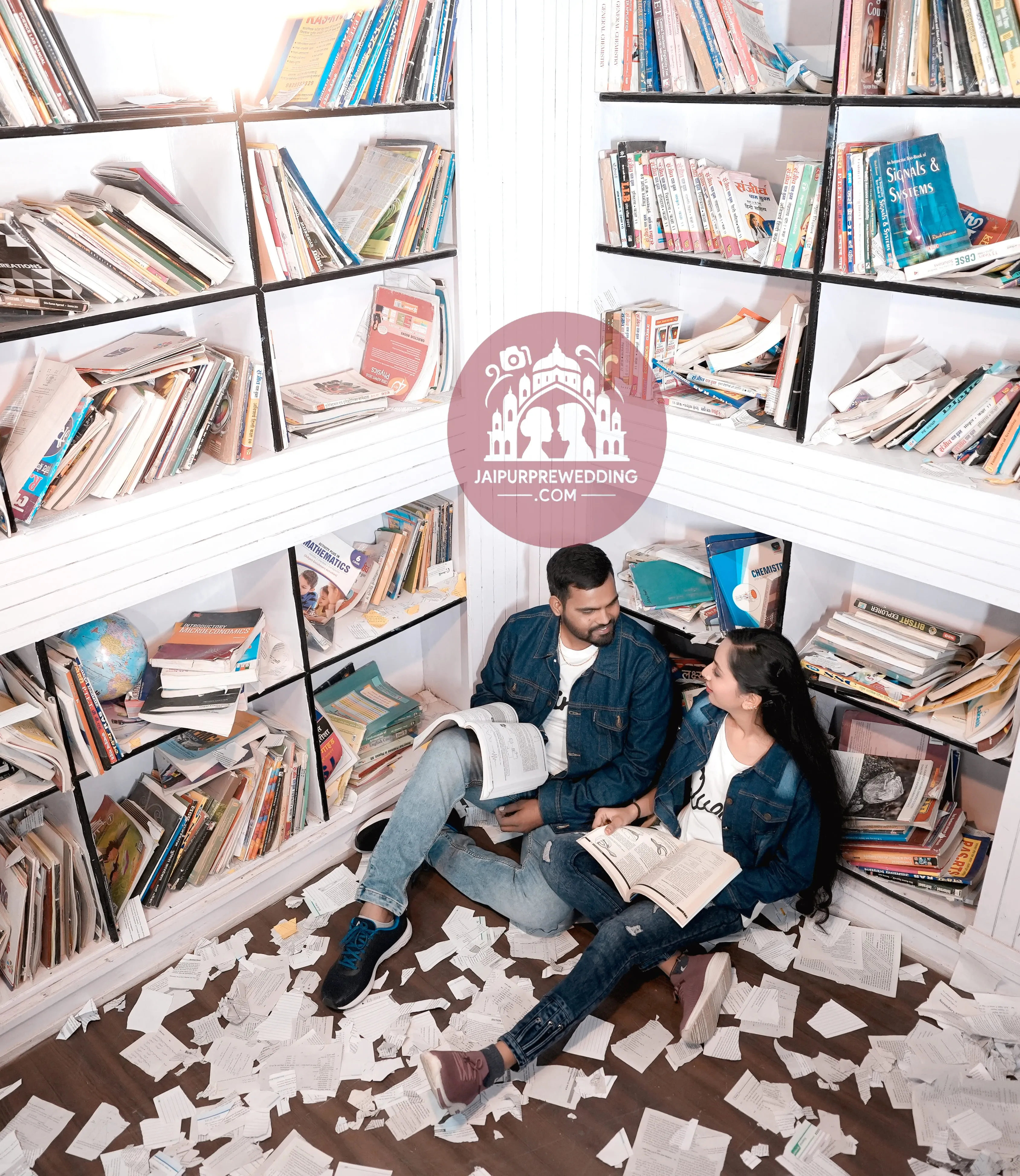 Couple library pre-wedding photoshoot Jaipur romantic reading scene